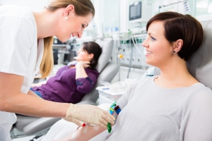 Female nurse preparing a patient